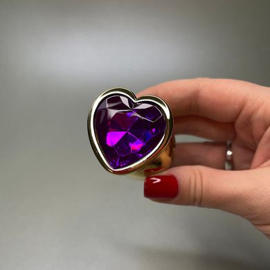 Золота анальна пробка сердечко з фіолетовим кристалом (2,8 см) - фото