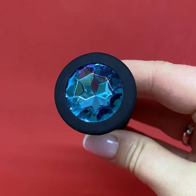Силіконова анальна пробка - чорна з блакитним кристалом (2,8 см) - фото