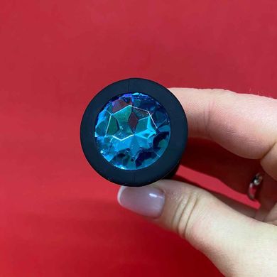 Силиконовая анальная пробка - черная с голубым кристаллом (2,8 см) - фото